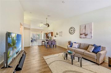 Bonita Springs house for rent - a living room with a couch and a television