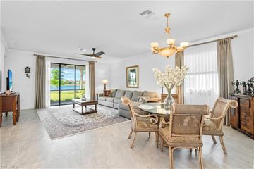 Estero house for rent - a living room and dining room with a couch and a table