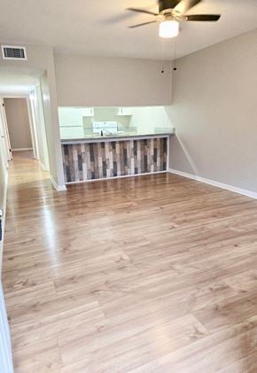 Broussard apartment for rent - an empty living room with a wooden floor