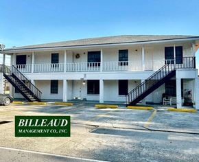 Broussard apartment for rent - an apartment building with a parking lot and stairs