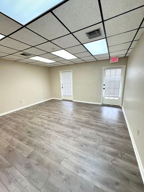 Lafayette apartment for rent - an empty room with wood floors and a door