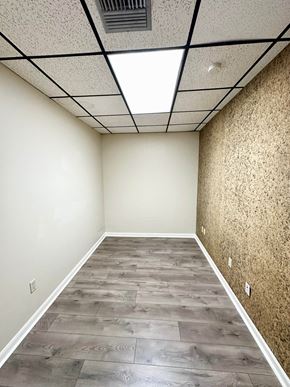 Lafayette apartment for rent - an empty room with wood flooring and a ceiling light