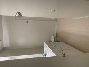 Chicago apartment for rent - a white bathroom with a toilet and a sink