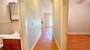 Bay City house for rent - the view from the bathroom into the living room and dining room