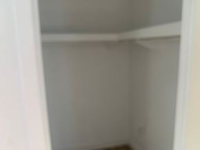 Greenwood house for rent - A white closet with a door open.