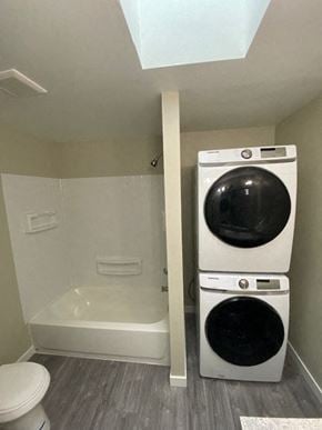 Seattle house for rent - a bathroom with a washing machine and a toilet