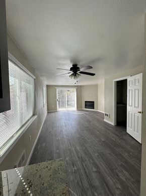 Seattle house for rent - an empty living room with a ceiling fan