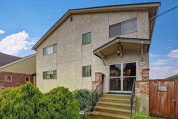 Seattle apartment for rent - the front of a house with stairs and a wooden door