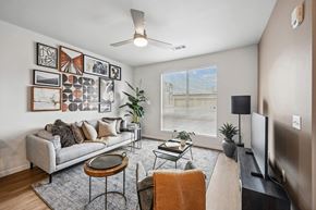 Denver apartment for rent - a living room with a couch and a tv