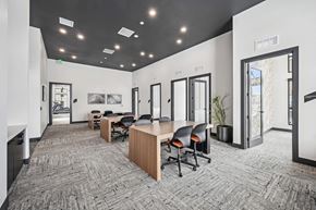 Denver apartment for rent - a conference room with a long table and chairs