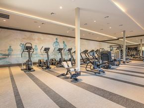 Pleasanton apartment for rent - A gym with treadmills and exercise equipment.