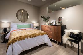 Los Angeles apartment for rent - A bedroom with a large bed and a wooden dresser.