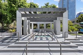 Los Angeles apartment for rent - A white archway with a pool in the middle of it.