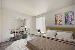 Los Angeles apartment for rent - A bedroom with a large bed and two paintings on the wall.