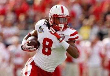 Lakewood apartment for rent - a football player running with a ball on a field