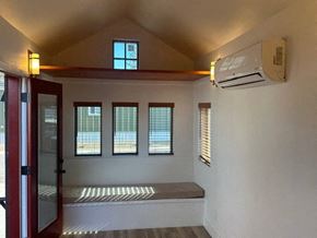 Flagstaff apartment for rent - a white room with a window and a air conditioner