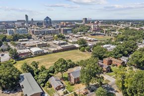 Durham apartment for rent - an aerial view of the city with a field in the foreground