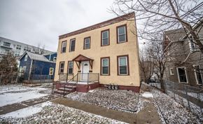 Minneapolis apartment for rent - the front of a house with snow on the ground