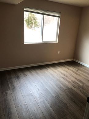 Marshall apartment for rent - A room with a window and wooden flooring.