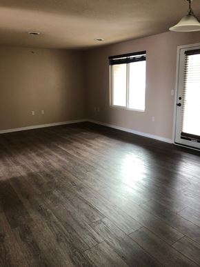 Marshall apartment for rent - A room with wooden flooring and a window with blinds.