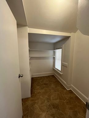 Waukegan apartment for rent - a bedroom with a closet and a window
