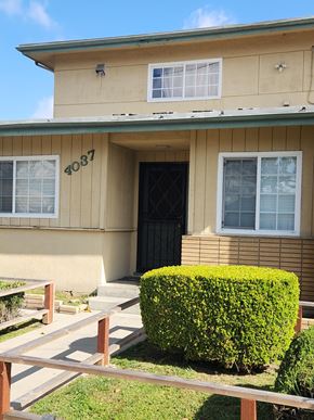 Hawthorne apartment for rent - the front of a house with a black door