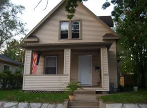 South Bend house for rent - A house with a flag on the window.