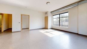 Minneapolis apartment for rent - the living room of an empty apartment with a large window
