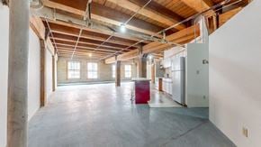St. Paul apartment for rent - an empty room with a refrigerator in the middle of it