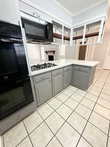 Lafayette house for rent - a kitchen with a counter top and a stove and a microwave