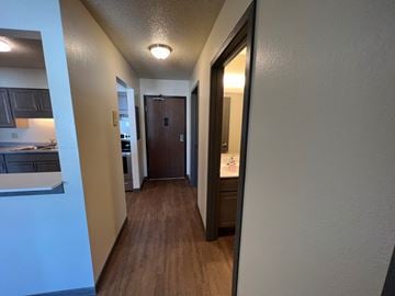 St. Martin apartment for rent - a hallway with a door to a bathroom and a kitchen
