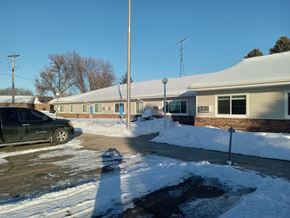 St. Martin apartment for rent - a house with snow on the ground and a car in the driveway