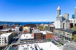Seattle apartment for rent - A cityscape with a clear blue sky above.