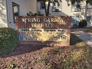 Berwick apartment for rent - a sign for spring garden terrace in front of a house