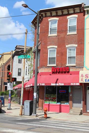 Philadelphia apartment for rent - a restaurant on the corner of a building on a city street