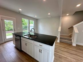 Moore house for rent - a kitchen with a sink and a counter top