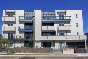 Los Angeles apartment for rent - A modern building with the number 1310 on the front.
