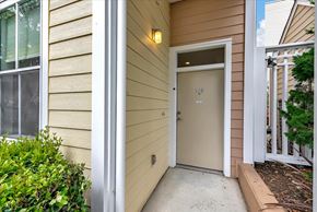 Mountain View house for rent - the front door of a house with a walkway and a porch