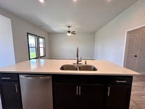 Baton Rouge house for rent - A kitchen with a sink and a trash can.