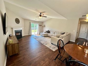 Piedmont house for rent - a living room with a couch and a table