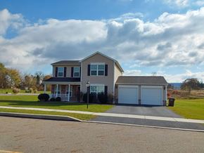 Halifax apartment for rent - a house with a driveway and a cloudy sky