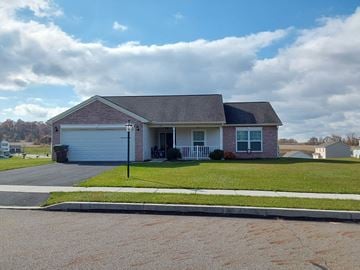 Halifax apartment for rent - a house with a driveway and a lawn