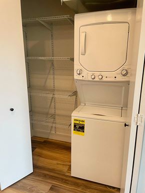 Jackson apartment for rent - a walk in closet with a washer and dryer