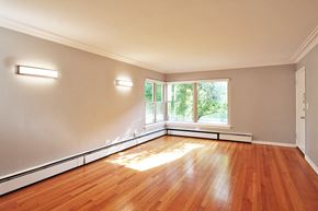Oak Park apartment for rent - an empty living room with wood floors and a window