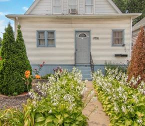 Hammond apartment for rent - the front of a white house with a blue door