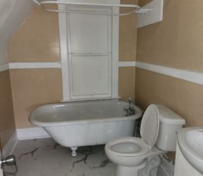 Hammond apartment for rent - a bathroom with a toilet and a bath tub