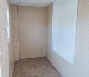 Hammond apartment for rent - a bathroom with a window and a tiled floor