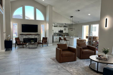 Irving house for rent - a large living room with furniture and a fireplace