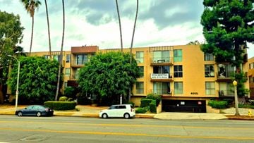 Studio City apartment for rent - A white car is parked in front of a building with the number 4055 on it.