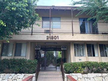 Canoga Park apartment for rent - The image shows the front of a building with the number 21801 on it.